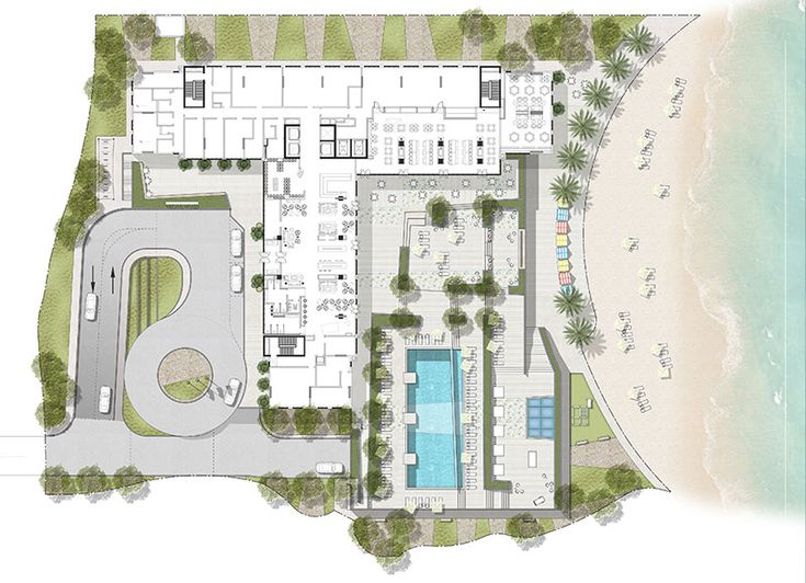 an aerial view of a beachfront resort with pool and hot tubs in the middle