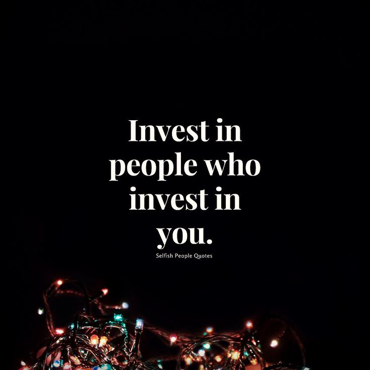 the words invest in people who invest in you on a black background with christmas lights