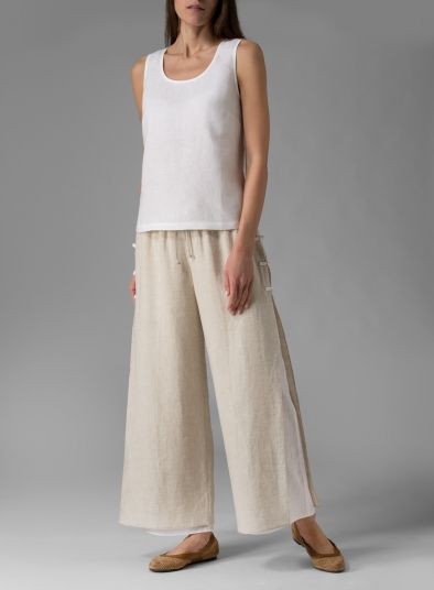 Chic Linen Loungewear Bottoms, Chic Linen Bottoms For Loungewear, Relaxed Wide Leg Loungewear Trousers, Elegant Beige Pants For Loungewear, Elegant Linen Pants For Loungewear, Relaxed Beige Wide-leg Pants, Linen Wide-leg Pants For Loungewear, Comfortable Linen Wide-leg Pants, Comfortable Wide-leg Linen Pants