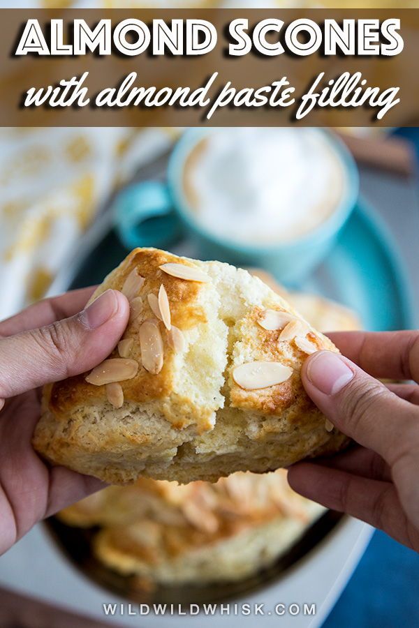 almond scones with almond paste filling in the middle and on top of a plate