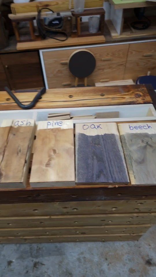 several pieces of wood sitting on top of a table