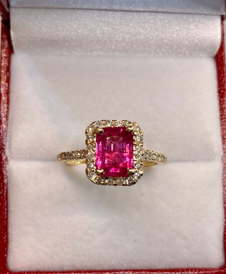 Beautiful 14k Yellow Gold Natural Emerald cut Ruby and Diamonds Ring 100%  Natural Ruby and natural Diamonds Beautiful genuine Ruby / treated-clarity enhanced Ruby:                                            2.31 CT Diamond(s)                                 0.55 CT Color:                                                    G Clarity:                                                SI1 Total ring weight:                        3.5 GR 14K Yellow Gold Ring sizing available Free of Charge For more in Luxury Oval Ruby Ring In Pink Gold, Yellow Gold Ruby Engagement Ring, Luxury Rectangular Yellow Gold Ruby Ring, Yellow Gold Ring With Baguette Cut Halo Setting, 14k Gold Halo Ring With Prong Setting, 14k Gold Emerald-cut Halo Cluster Ring, 14k Gold Emerald Cut Halo Cluster Ring, 14k Gold Emerald-cut Cluster Ring With Halo Design, 14k Gold Emerald Cut Cluster Ring With Halo Design