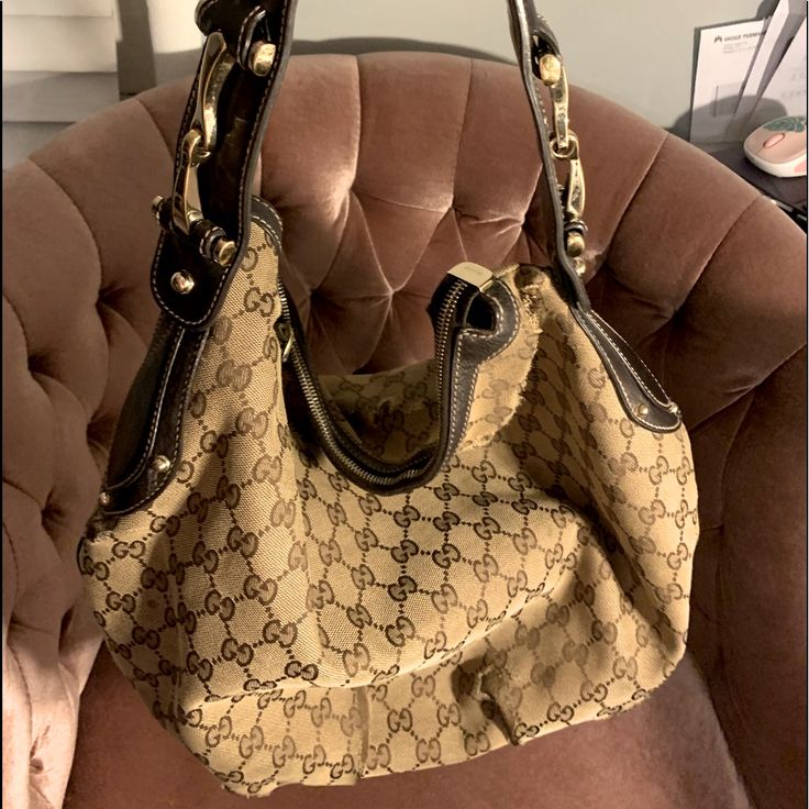 Authentic Pre-Loved Gucci Canvas Purse Clean But Used As Seen In Pictures. Interior Looks Great But Damaged On Canvas . No Returns. Vintage Gucci Bag, Vintage Gucci Coated Canvas Shoulder Bag, Gucci Hobo Bag, Brown Gucci Bag With Silver-tone Hardware, Gucci Vintage Bag, Gucci Coated Canvas Shoulder Bag With Gold-tone Hardware, Pre-owned Brown Gucci Bag, Hobo Tote Bag, Gucci Monogram