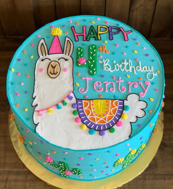 a birthday cake with an image of a llama on it