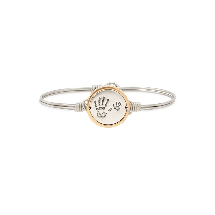 Luca + Danni's iconic, stacking bracelets are made in the US and shaped to sit top of wrist so you can express the things that matter most to you. Treasure that blessed moment and little one in your life with this bangle bracelet, featuring an oval design for a more comfortable fit. Luca + Danni's iconic, stacking bracelets are made in the US and shaped to sit top of wrist so you can express the things that matter most to you. Treasure that blessed moment and little one in your life with this ba Stackable Bangle Bracelets For Friendship, Stackable Friendship Bangle Bracelets, Nickel-free Bracelets For Mother's Day, Stackable Bangle Bracelet For Friendship, Nickel-free Mother's Day Bracelets, Metal Stretch Bracelet Stackable Gift, Adjustable Stackable Stainless Steel Bracelets, Adjustable Stackable Bangle Name Bracelet, Nickel Free Adjustable Everyday Bangle