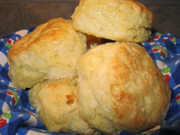 a pile of biscuits sitting on top of a blue and white cloth