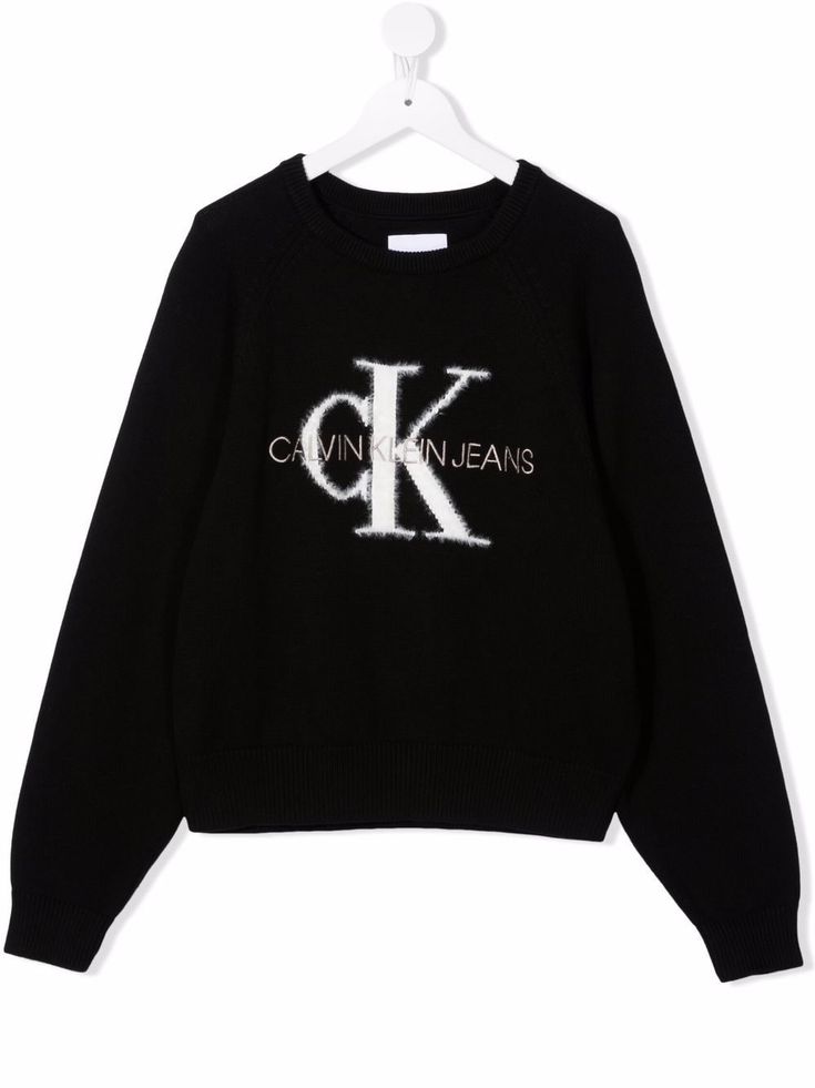 Black cotton logo-knit sweatshirt from CALVIN KLEIN KIDS featuring crew neck, embroidered logo at the chest, long sleeves and ribbed cuffs. Casual Black Sweater With Logo, Black Logo Sweater For Fall, Logo Crew Sweater For Fall, Black Sweater With Embroidered Logo For Winter, Logo Cotton Sweater For Fall, Casual Winter Tops With Appliqué Logo, Fall Cotton Sweater With Logo, Fall Crew Neck Sweater With Logo, Winter Long Sleeve Tops With Appliqué Logo