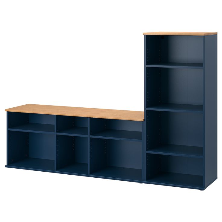 a blue bookcase with two open shelves on the top and one closed shelf below