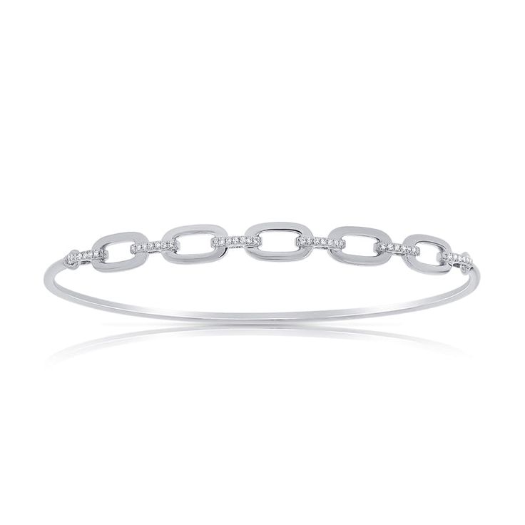 Enhance your elegance with the 14K Gold Designer Links Diamond Bangle. This exquisite piece is crafted from luxurious 14K gold and features a unique design of interlocking links. Each link is adorned with sparkling diamonds, totaling 0.14 carats, adding a touch of brilliance and sophistication to the bracelet. The intricate design and radiant diamonds make this bangle a standout accessory for both everyday wear and special occasions. With a secure clasp and a comfortable fit, this diamond bangle Anniversary Diamond Bracelet With Solid Link Construction, Silver Diamond Bracelet With Solid Link Construction, Diamond Chain Link Bracelet In White Gold, Diamond Link Bracelet With Jubilee Design, White Gold Chain Link Bracelet With Diamond Accents, Diamond Chain Bangle Bracelet With Single Cut Diamonds, White Gold Chain Bracelet For Anniversary, White Gold Diamond Accents Chain Bangle, White Gold Diamond Chain Bracelet With Oval Links