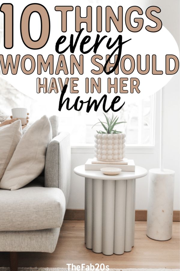 a white couch sitting next to a table with a potted plant on it and the words 10 things every woman should have in her home