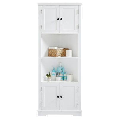 a white shelf with two drawers and some bottles