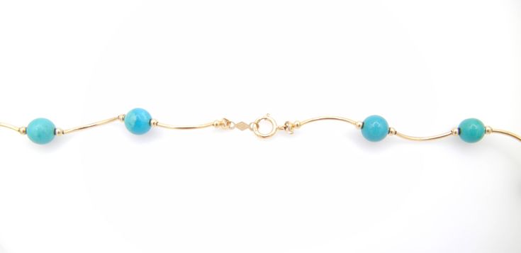 "Turquoise 14k Yellow Gold Necklace Measures 16.5 Inches Long or 42 cm 18 round turquoise beads measuring approximately 6 mm each Total weight: 6.2 Grams 082212-198V FEEL FREE TO MESSAGE ME WITH A BEST OFFER OR IF YOU WISH TO SEE MORE PICTURES! Save money! We combine shipping where you pay only $1.00 more for any additional items on the same order! * Back to Shop Watch and Wares? https://www.etsy.com/shop/watchandwares * Ready to purchase? Click the green button \"Add to cart\" * Have a question Elegant Turquoise Jewelry With Gemstone Beads, Elegant Turquoise Gemstone Necklace With Round Beads, Elegant Turquoise Necklace With Gemstone Beads, Elegant Turquoise Necklace With Round Beads For Jewelry Making, Elegant Turquoise Gemstone Bead Necklace, Elegant Turquoise Necklace With Polished Beads As Gift, Elegant Turquoise Necklace With Round Natural Stones, Elegant Blue Turquoise Necklace With Polished Beads, Elegant Turquoise Necklace With Polished Beads For Gift