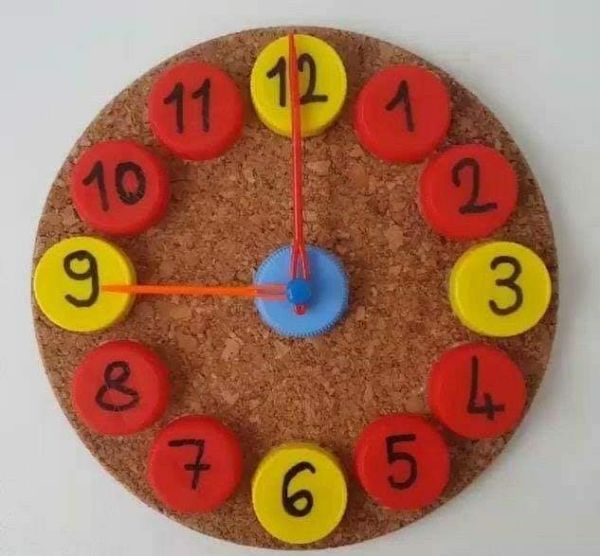 a clock made out of cork with numbers on it