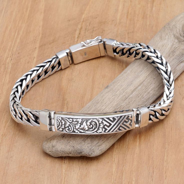 Traditional Balinese motifs embellish the polished pendant of this bracelet, handcrafted from sterling silver by artisan Asmara Putra. Being an expert in metalwork, Asmara creates a sturdy braided chain with a push-button clasp for an easy and comfortable fit. Silver Bracelets For Men, Mens Bracelet Fashion, Silver Bracelet Designs, Men Bracelets, Mens Silver Jewelry, Sterling Silver Cross Pendant, Traditional Motifs, Suv Cars, Silver Cross Pendant