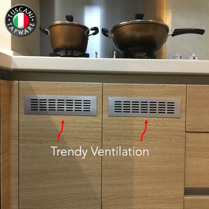 two pots on top of a kitchen counter with the words trendy ventilation below them