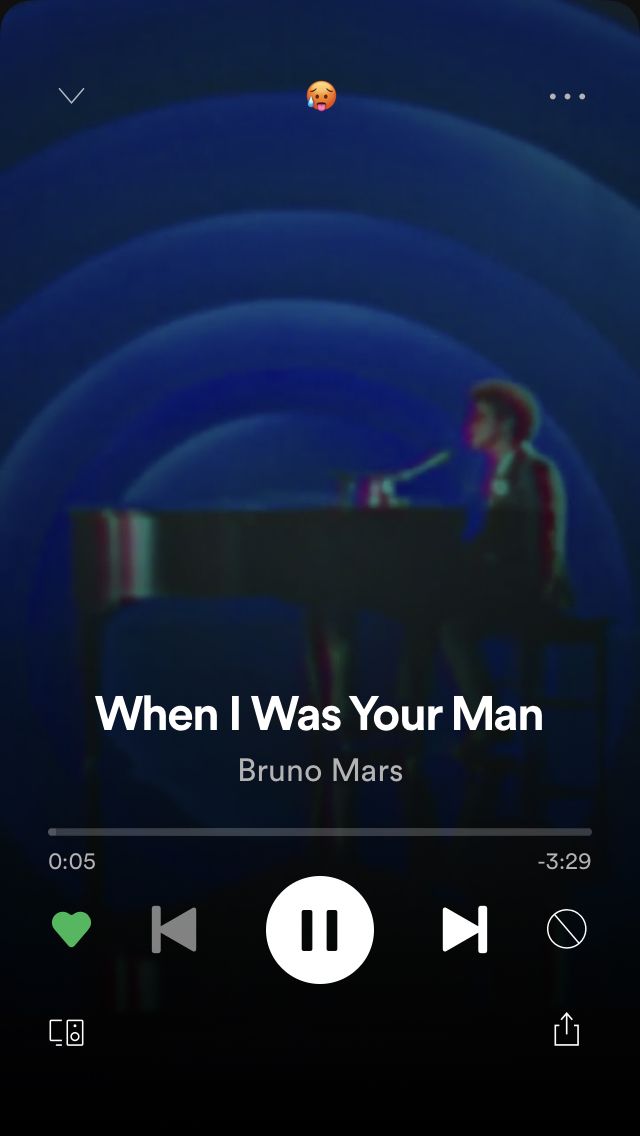 an iphone screen with the words when i was your man on it, and a piano