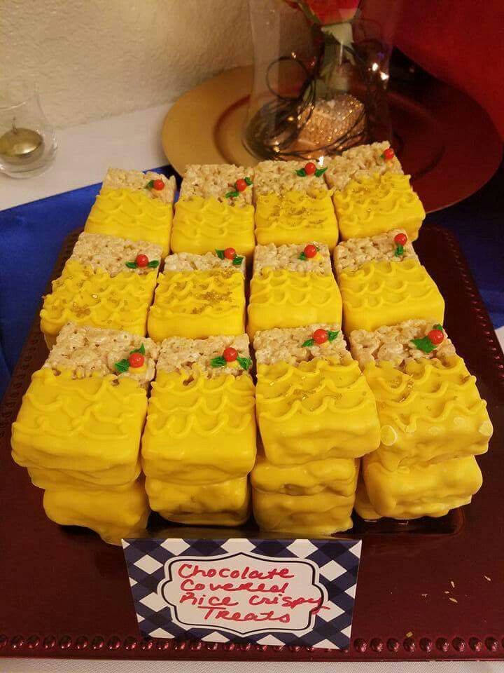 a table topped with lots of yellow desserts