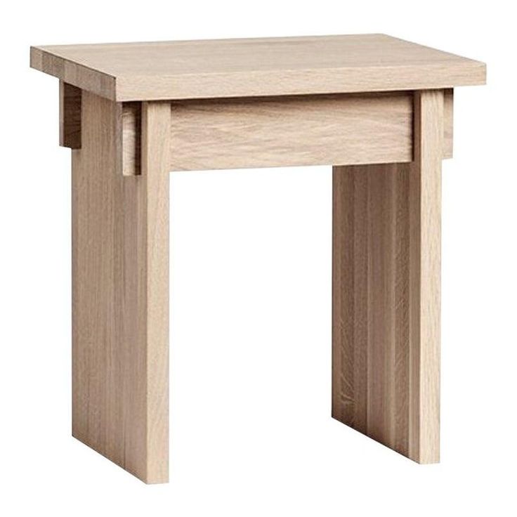 a small wooden table with one drawer open