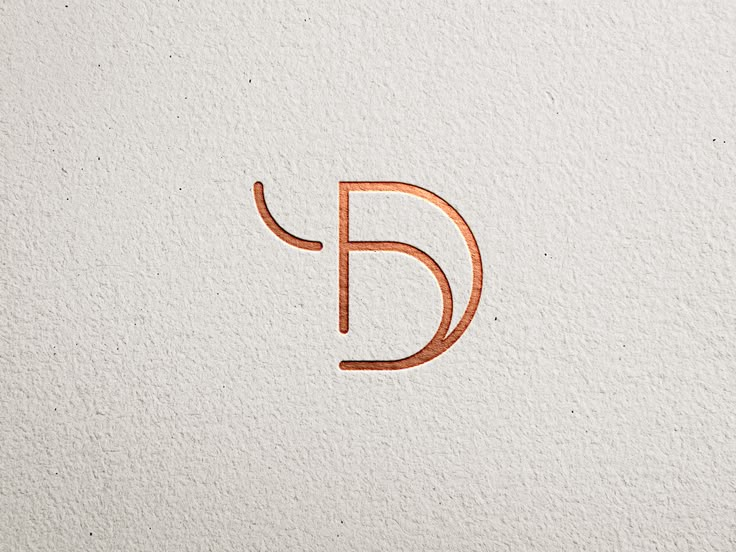 the letter d is made from copper foil