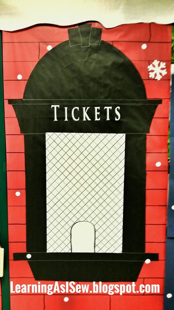 a red and black ticket booth with snowflakes on it