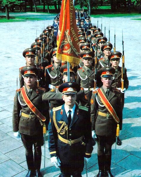 a group of men in uniform standing next to each other