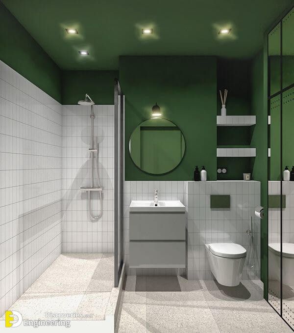 a bathroom with green walls and white tiles on the floor is shown in this image