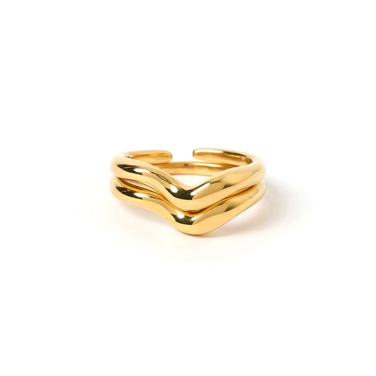 Our gorgeous golden Simi Ring is designed to overlap or stack. This piece is versatile and is therefore perfect for any and every look. The two perfectly tessellating shapes come together to form the perfect match, taking your ring stack to the next level!  14k Gold Plated (1 micron plating) Stainless Steel Base E-coating for a premium finish Lead & Nickel Free Tarnish and Water Resistant CARING FOR YOUR AOE JEWELS  At Arms Of Eve, we take great pride in the quality of all our jewels. All of our Gold Stackable Rings With Modern Twist, Modern Twist Gold Stackable Rings With Open Band, Gold Stackable Rings With Open Band In Modern Style, Gold Stackable Rings With Open Band And Modern Twist, Modern Twist Gold Stackable Rings, Gold Double Band Stackable Rings With Modern Twist, Modern Gold Double Band Stackable Rings, Dad Jewelry, June Birthstone Jewelry