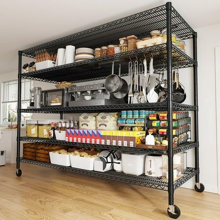 an organized kitchen with black shelving and lots of food