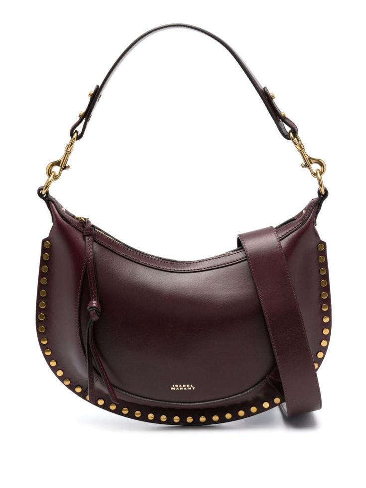 Find ISABEL MARANT Naoko Leather Shoulder Bag on Editorialist. The ISABEL MARANT Naoko shoulder bag is crafted from calf leather. The bag features a top zip fastening, a single detachable top handle, a detachable shoulder strap, gold-tone stud detailing, gold-tone hardware, and an internal slip pocket. The bag has a logo stamp on the front and an internal logo stamp. It is a hobo bag. Isabel Marant Bag, Unrealistic Wishlist, 2024 Wishlist, Brown Accessories, Leather Logo, Logo Stamp, Urban Outfits, Hobo Bag, Isabel Marant