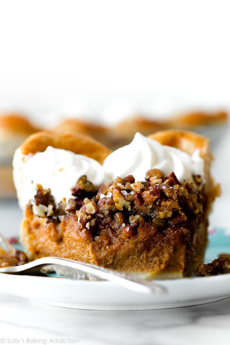 a slice of pecan pie with whipped cream on top