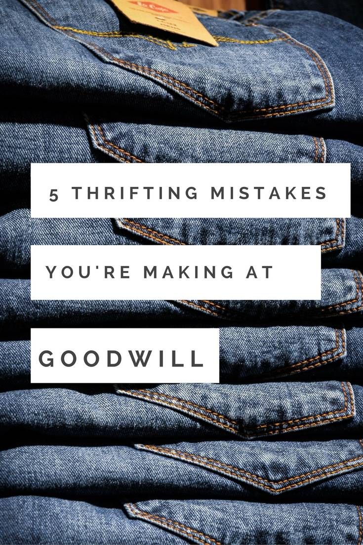 some blue jeans stacked on top of each other with the words 5 thrifting mistakes you're making at good will