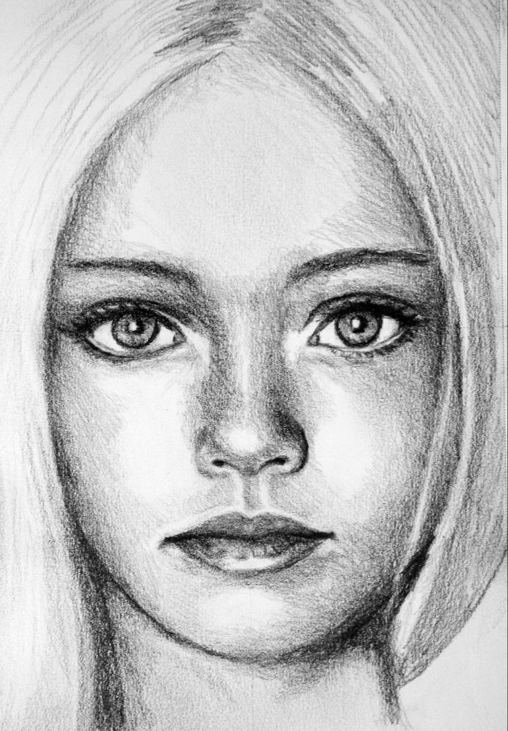 a pencil drawing of a woman's face with long blonde hair and blue eyes