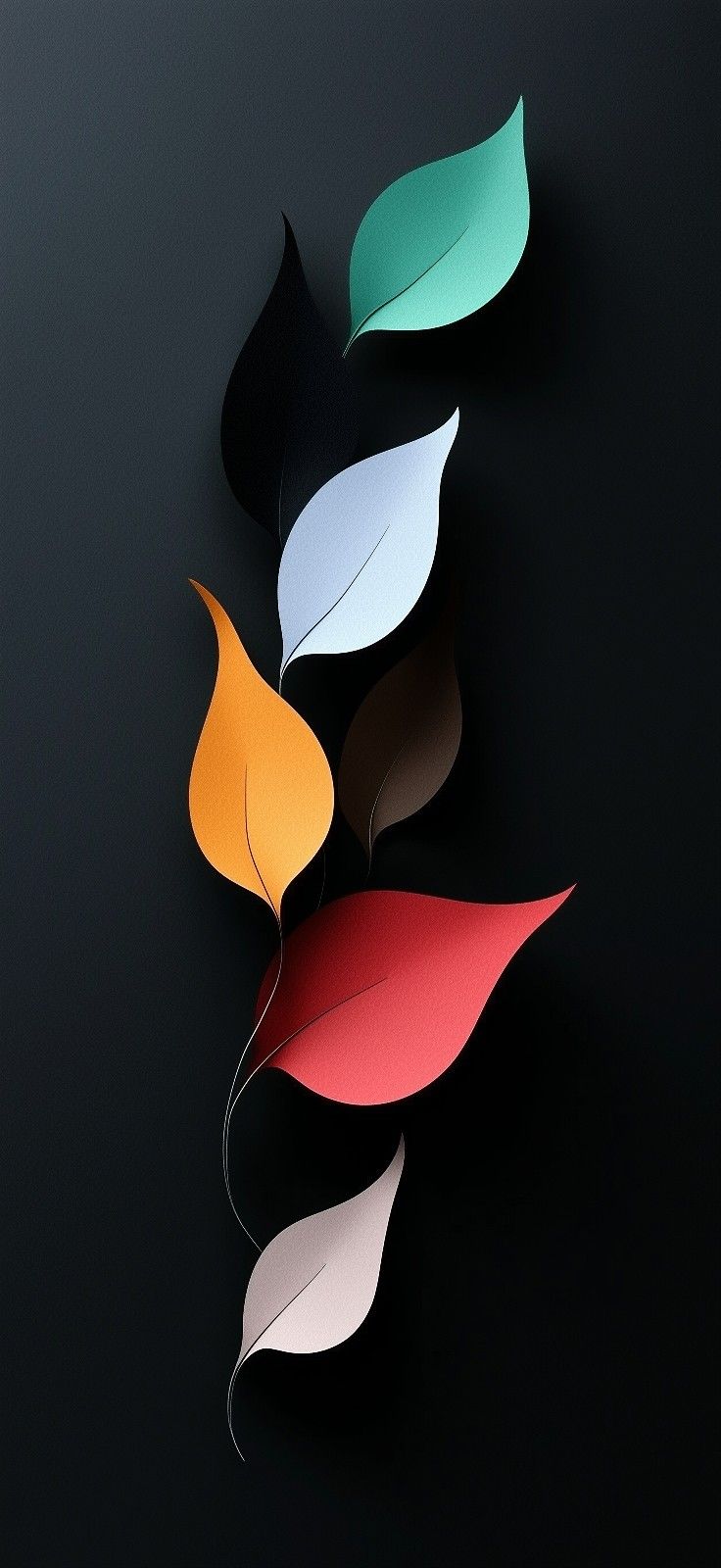 four different colored leaves on a black surface