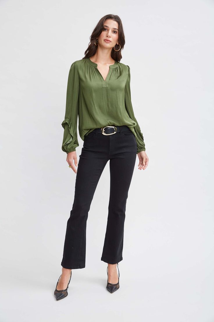 It's all in the details. Romantic & feminine, our long sleeve shirt features a split tie neckline & pleated bodice detailing. With its long blouson sleeves & effortless fit, this style is a year-round essential. T-Tahari Long sleeve Airflow Blouse with Pleat Detailing & Blouson Sleeves Runs true to size Model is 5'9" and wearing size S Dry Clean Only Imported Style #: THF48008 Chic Long Sleeve Top With Blouson Sleeves, Stretch Blouson Sleeve Workwear Blouse, Stretch Blouson Sleeves Blouse For Work, Stretch Blouse With Blouson Sleeves For Work, Chic Long Sleeve Top With Blouson Sleeves For Fall, Fall Business Casual Stretch Blouse, Stretch Blouse For Business Casual In Fall, Fall Stretch Blouse For Business Casual, Fall Blouse With Blouson Sleeves And Split Neck