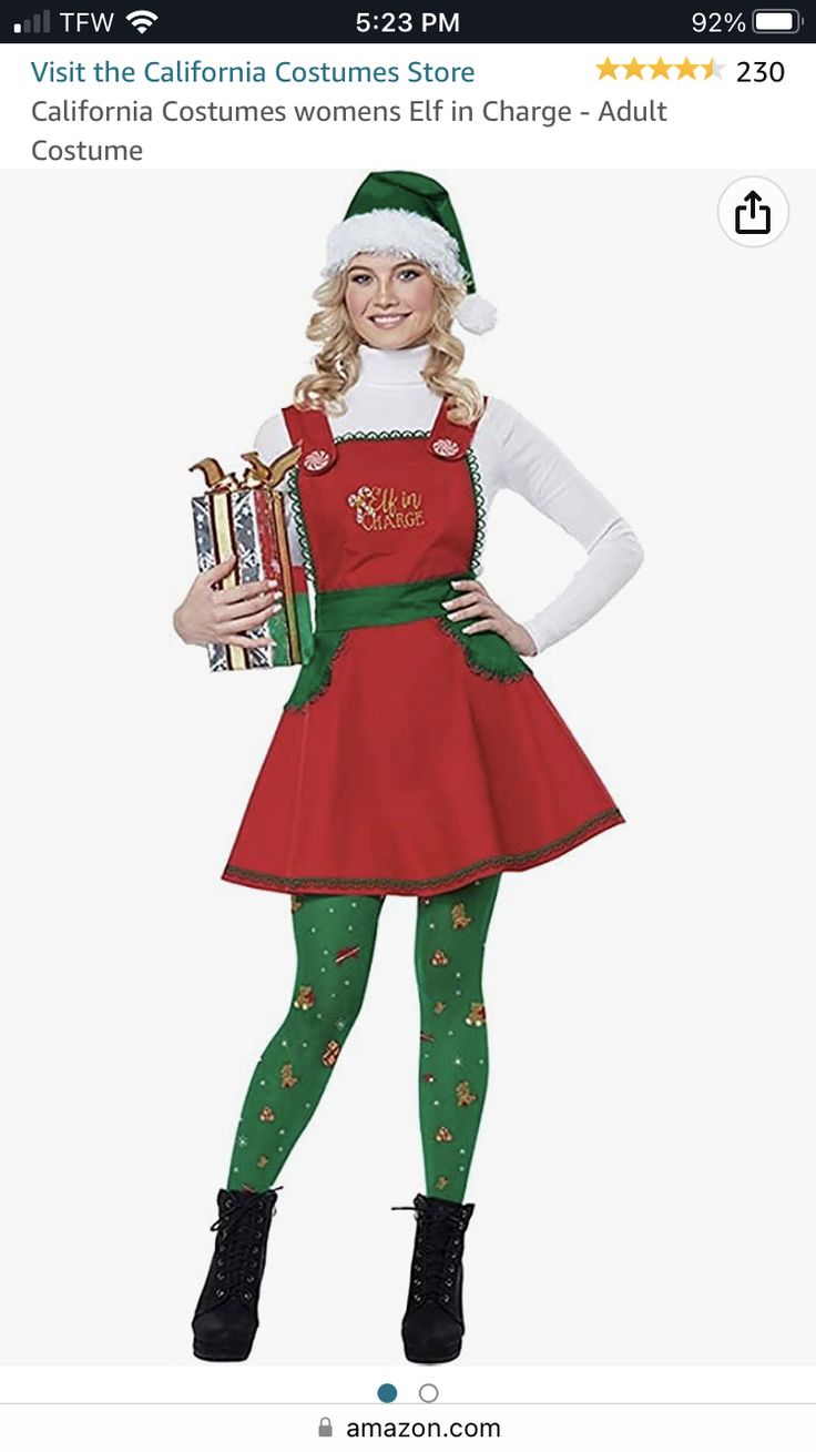 a woman dressed as santa clause holding a trophy and wearing green tights while standing in front of an amazon page