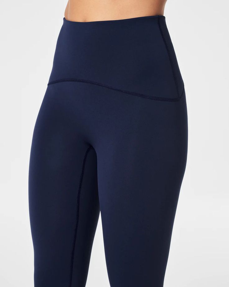 Active leggings with a built-in butt lift! Designed with our signature sculpting performance fabric and a contoured waistband, this flattering style is engineered to give you the best rear view. Signature contoured waistband gives your booty a boostSculpting performance fabric Sweat-wicking, breathable & quick-dryComfortable, 4-way stretch High-rise waistband Center-seam free for no more camel toeHidden pocket in waistband fits a phoneInseam: 25" when worn Body: 68% Nylon, 32% Elastane. Pocket: Navy Leggings, Button Outfit, Plus Size Activewear, Active Leggings, Team Apparel, Sweaters And Leggings, Performance Fabric, Tee Dress, Clothes Collection