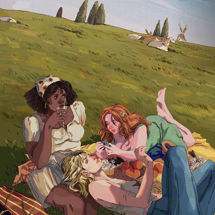 three women sitting on the grass in front of an open field, one holding a cell phone to her ear