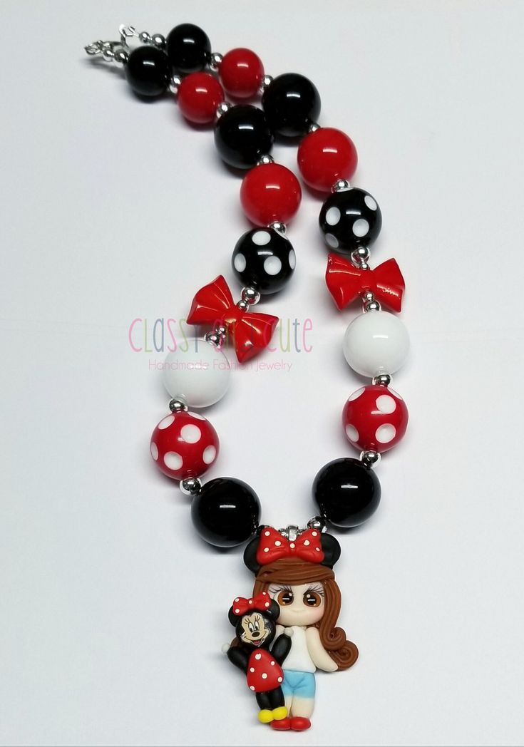 This listing is for one Minnie and Me Necklace.  Necklace is available in 16 or 18 inches in length.   Lobster clasp closure with a 2 inch extender chain.   20mm acrylic bubblegum beads in red, black, polka dot red and white, and polka dot black and white beads.   24mm red acrylic bow beads.  Pendant is made of polymer clay material.  6mm silver spacer beads.  Matching beaded bracelets available for additional charge upon requests. Just contact me.  Thank you for looking. 😊 Product color may di Bow Beads, Clay Material, Mini Necklace, Beads Pendant, Bubblegum Beads, Necklace Necklace, White Beads, Spacer Beads, Baby Accessories