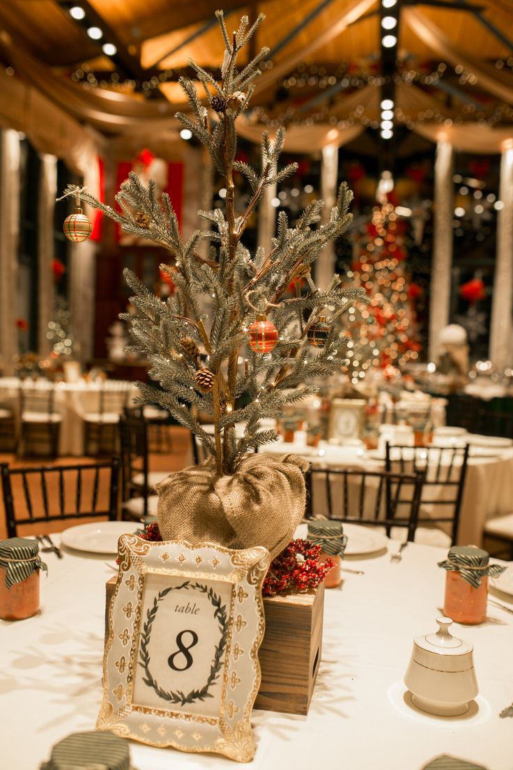 a table with a christmas tree and decorations on it