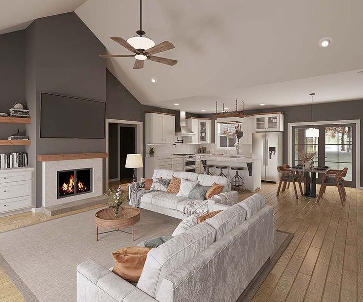 a living room filled with furniture and a fire place in the middle of a kitchen