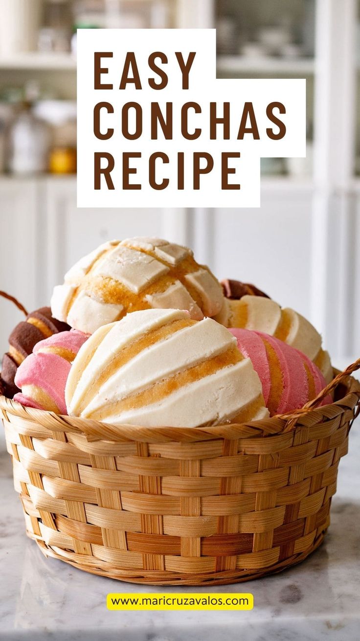 a basket filled with ice cream sitting on top of a counter next to a sign that says easy conchas recipe