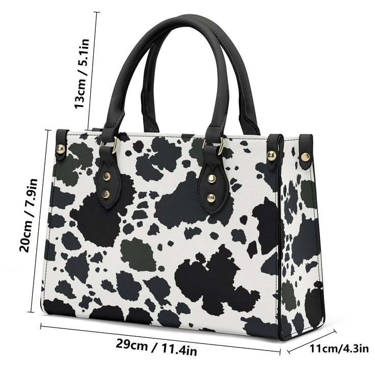 Grab the hottest fashion statement of the season with this Moo-licious Cow Print Luxury Tote Handbag! Perfect for giving your everyday look a sweet and sassy twist, this bag is sure to turn heads. It's made from a high-quality, durable material that will keep your belongings safe and secure making it as functional as it is fashionable. Moo-ve over handbags, this moo-tastic tote can't be beat! Features: . 100% high-grade vegan leather . Polyester lining w/ 2 internal pockets . Reinforced handles Chic Double Handle Satchel As Gift, Chic Double Handle Bag For Gift, Trendy Double Handle Box Bag For Gift, Trendy Double Handle Box Bag Gift, Chic Box Bag As Gift, Chic Box Bag With Handles For Gifts, Trendy Double Handle Satchel As Gift, Chic Bag With Handles As Gift, Tote Handbag