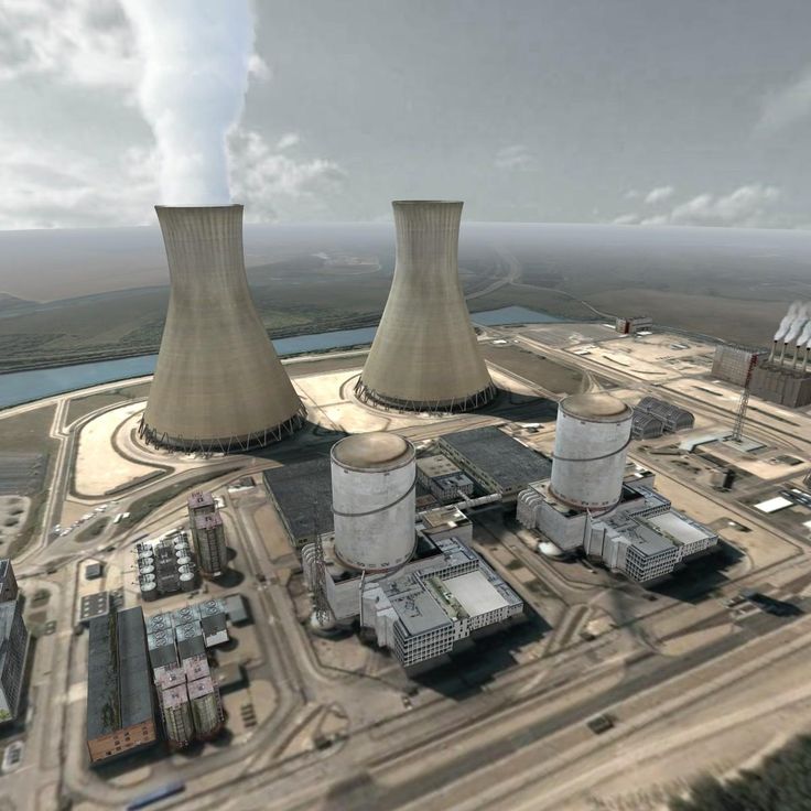 an artist's rendering of two cooling towers in the middle of a large industrial area