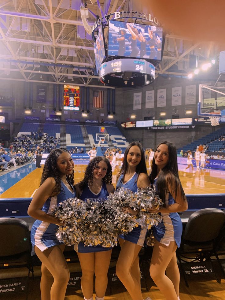 the cheerleaders are posing for a photo