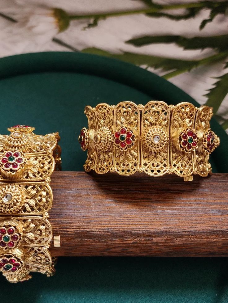 This pair of Indian bangles are perfect blend of modern luxury and traditional style. These bangles are beautifully handcrafted with utmost precision and skill. Our designers have spent hours on this piece to meet your special occasion needs. It is perfect choice for brides, pair this with your rest of the jewelry for a complete royal look. Details & Specifications: Openable kada fits 2 '4 to 2 '8 Hand Set 22k Gold Festive Bracelets, 22k Gold Meenakari Bangle Bracelet, Festive Brass Bangle With Intricate Design, Traditional Metal Bangle With Tilla, Traditional Round Metal Bangle, 22k Gold Meenakari Bracelets As Gift, Yellow Gold Meenakari Bracelets For Wedding, Gold Plated Round Bangle For Wedding, Bollywood Style Bangle Jewelry As Gift