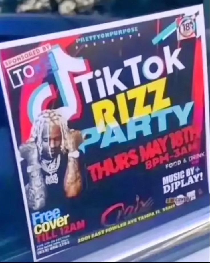 a sign advertising tiktok riz party on the side of a car window