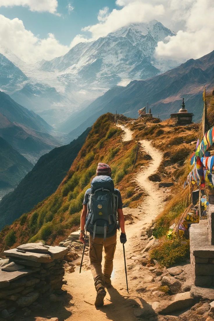 a man hiking up the side of a mountain with backpack and ski poles on his back