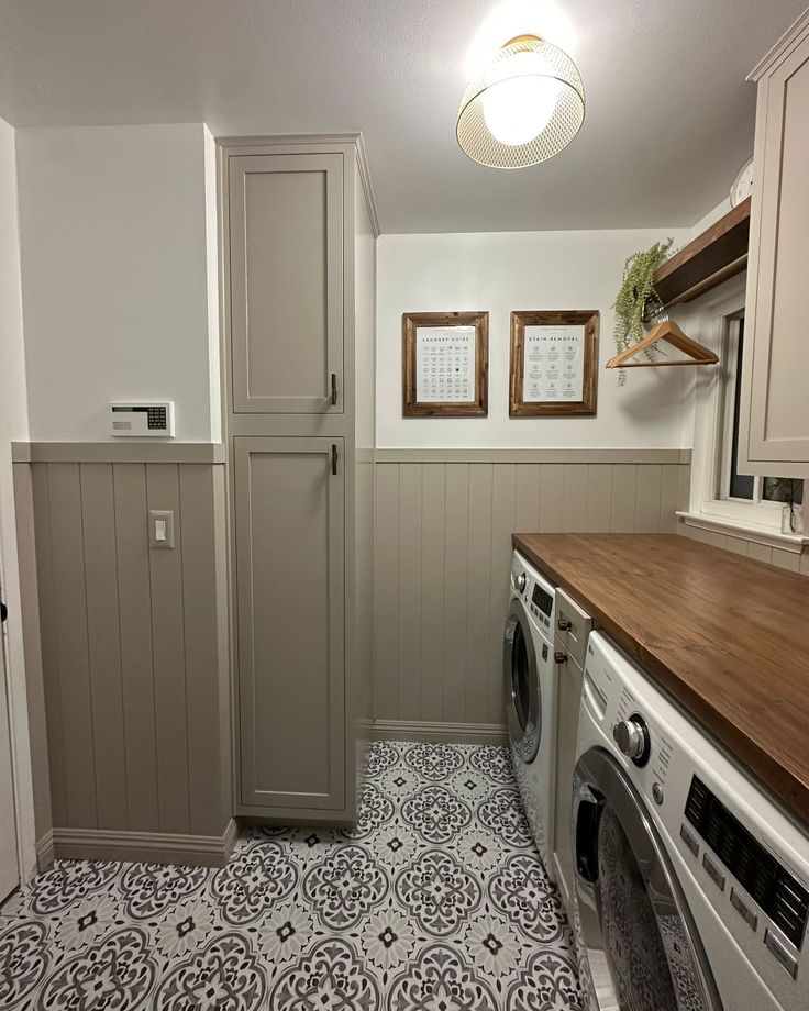 a washer and dryer in a small room