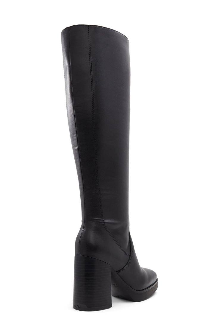 Take your look to the next level with this streamlined knee-high boot featuring a bold block heel and comfortable, well-cushioned footbed. 3 3/4" heel 14 1/4" heel; 12 1/2" shaft circumference. Narrow calf Cushioned footbed with dual-density foam Leather and textile upper and lining/synthetic sole Imported Sleek Block Heel Knee-high Boots For Fall, Sleek Knee-high Boots With Block Heel For Fall, Sleek Knee-high Boots With Block Heel, Sleek Block Heel Knee-high Boots For Work, Sleek Wide Calf Block Heeled Boots, Modern Wide Calf High Heel Knee-high Boots, Black Knee-high Boots With Reinforced Heel, Modern Knee-high Boots With Stacked Heel For Work, Black Tall Knee-high Boots With Reinforced Heel