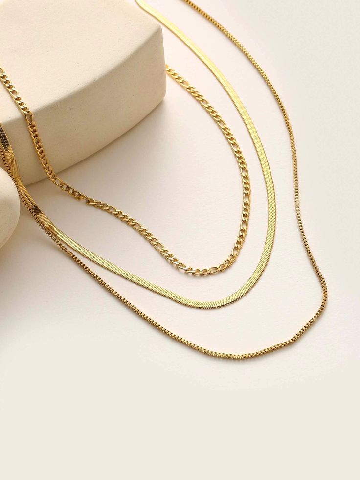 Layered Chain Necklace - Women's Necklaces - Someone & HerOwn Delicate Gold Snake Chain Necklace, Gold Double Strand Figaro Chain Necklace, Chic Double Strand Adjustable Chain Necklace, Trendy Double Strand Gold Chain Necklace, Gold Layered Snake Chain Necklace With Adjustable Chain, Chic Double Strand Chain Necklace With Adjustable Chain, Chic Gold Figaro Chain Necklace, Chic Long Layered Necklace With Delicate Chain, Chic Everyday Double Strand Layered Necklace